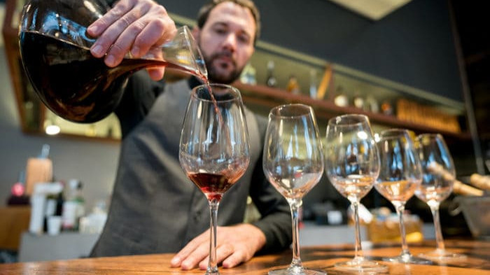When done correctly, decanting a wine can elevate even the most average wine experience. / Getty