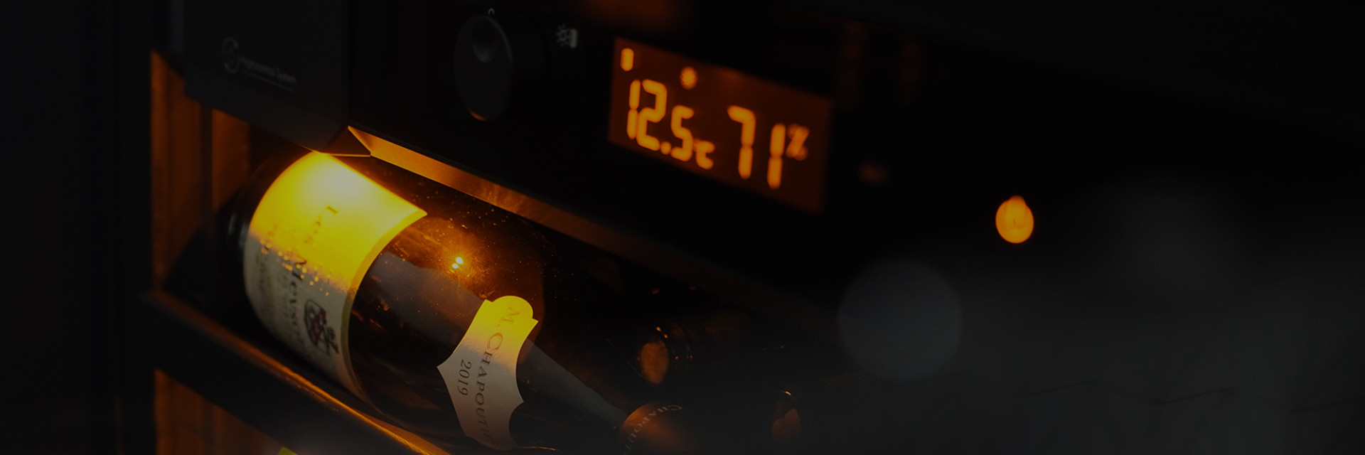 Wine aging - reaching the perfect temperature of 12°C and the ideal humidity of 70% inside the wine cooler. Wine aging - reaching the perfect temperature of 12°C and the ideal humidity of 70% inside the wine cooler.