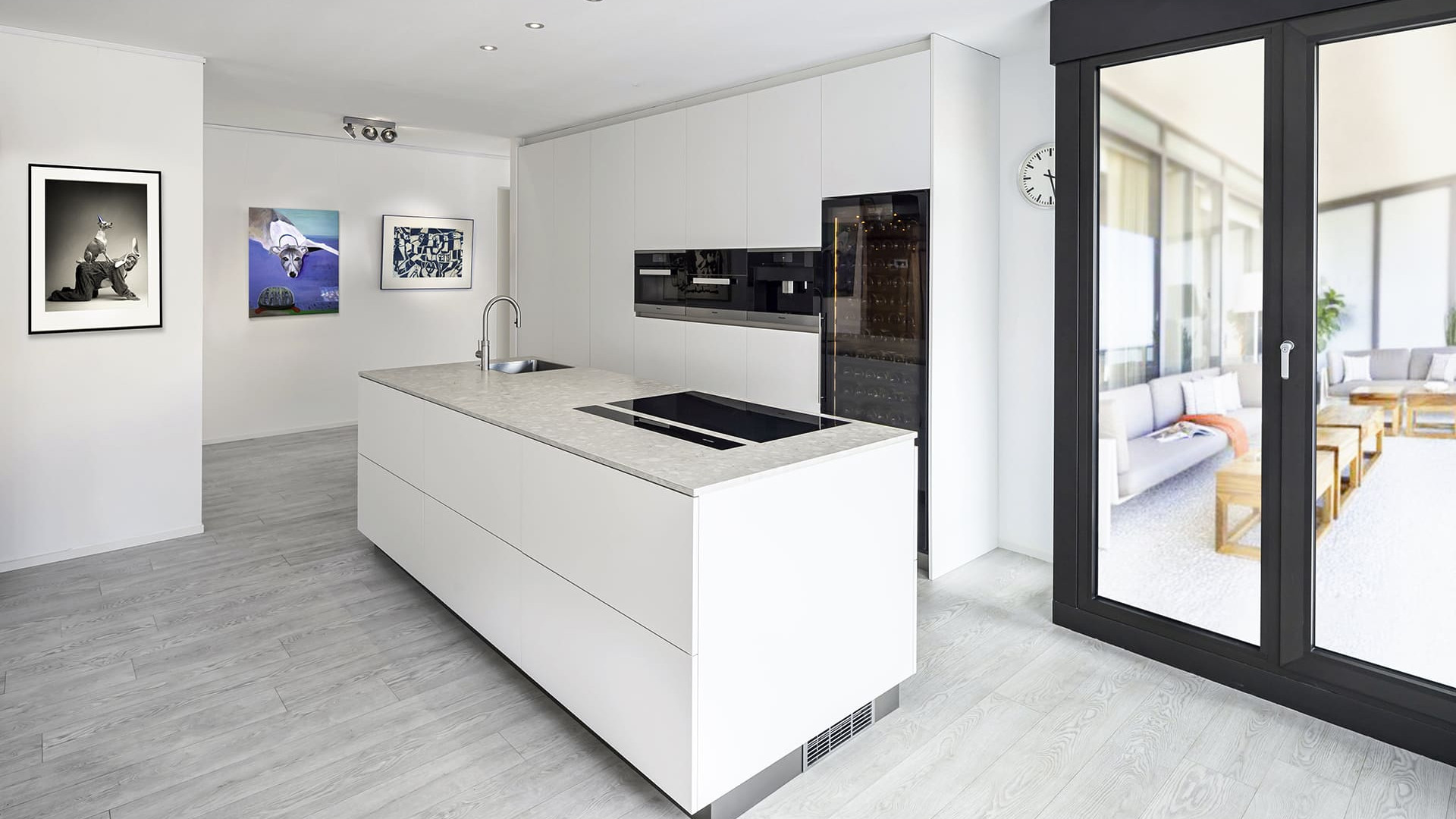 Example of a built-in free-standing wine cabinet in a kitchen with a white and black color scheme in a luxury apartment. EuroCave Revelation Example of a built-in free-standing wine cabinet in a kitchen with a white and black color scheme in a luxury apartment. EuroCave Revelation