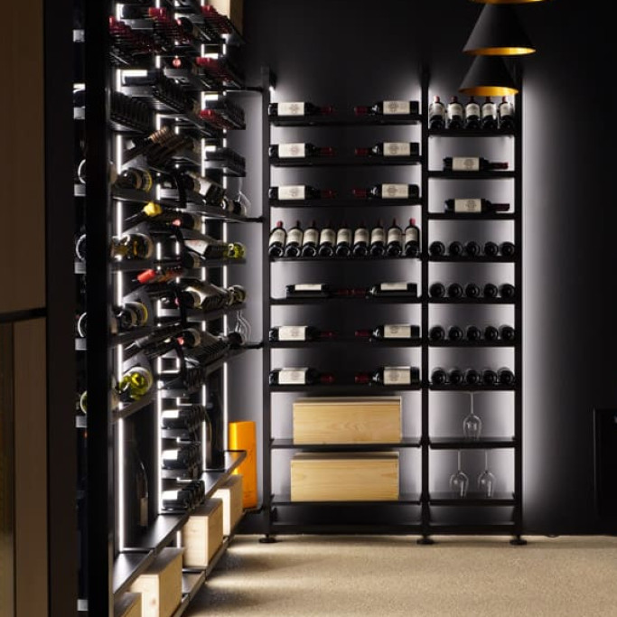 Beautiful display of wines with this designer black metal storage and its overhead shelves with individual bottle holders. Beautiful display of wines with this designer black metal storage and its overhead shelves with individual bottle holders.