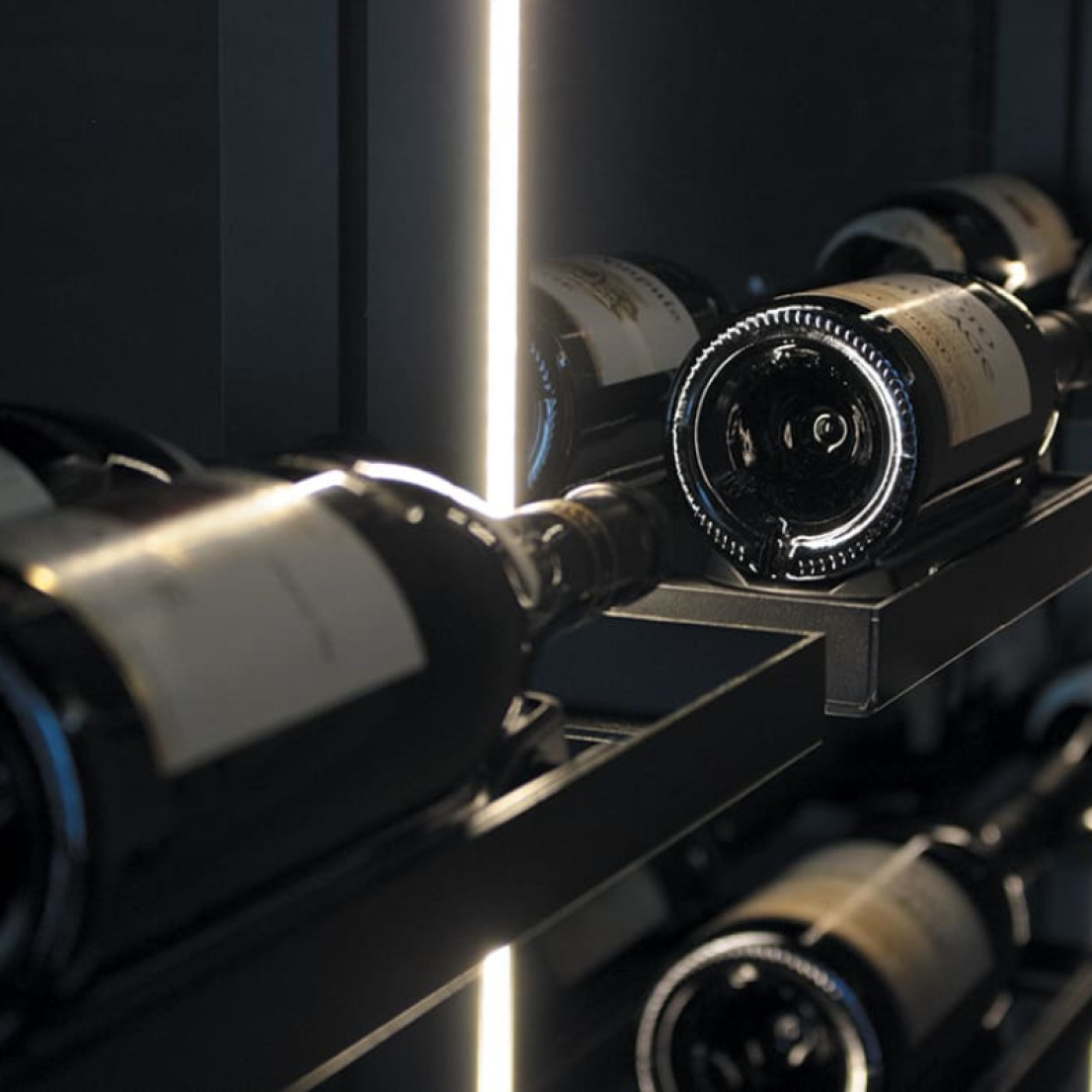 Backlit wine cellar storage in black metal to showcase your most beautiful bottles. Backlit wine cellar storage in black metal to showcase your most beautiful bottles.