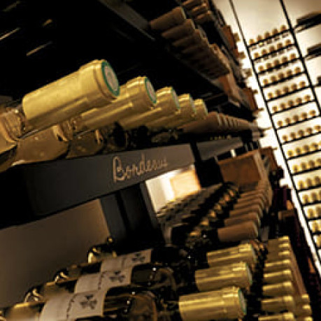 Solid wine storage shelves in steel and black aluminum, modular, adjustable height, wall or ceiling mounting. Solid wine storage shelves in steel and black aluminum, modular, adjustable height, wall or ceiling mounting.