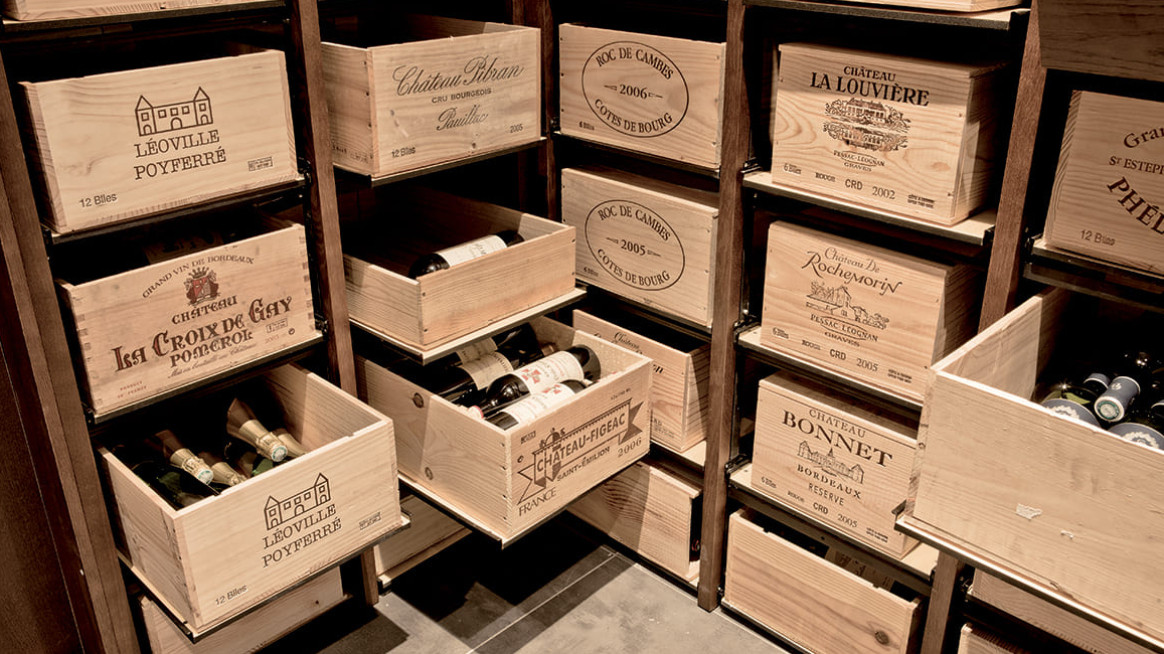 Modular wine storage - sliding racks that can be assembled to store wine wood box in a cellar over time to age the wine. Modular wine storage - sliding racks that can be assembled to store wine wood box in a cellar over time to age the wine.
