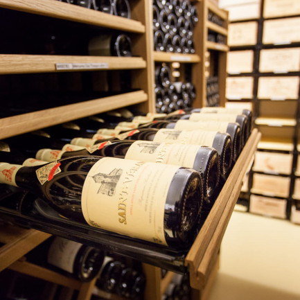 Bottle rack with sliding shelves to classify your individual wine collection with visible labels. Bottle rack with sliding shelves to classify your individual wine collection with visible labels.