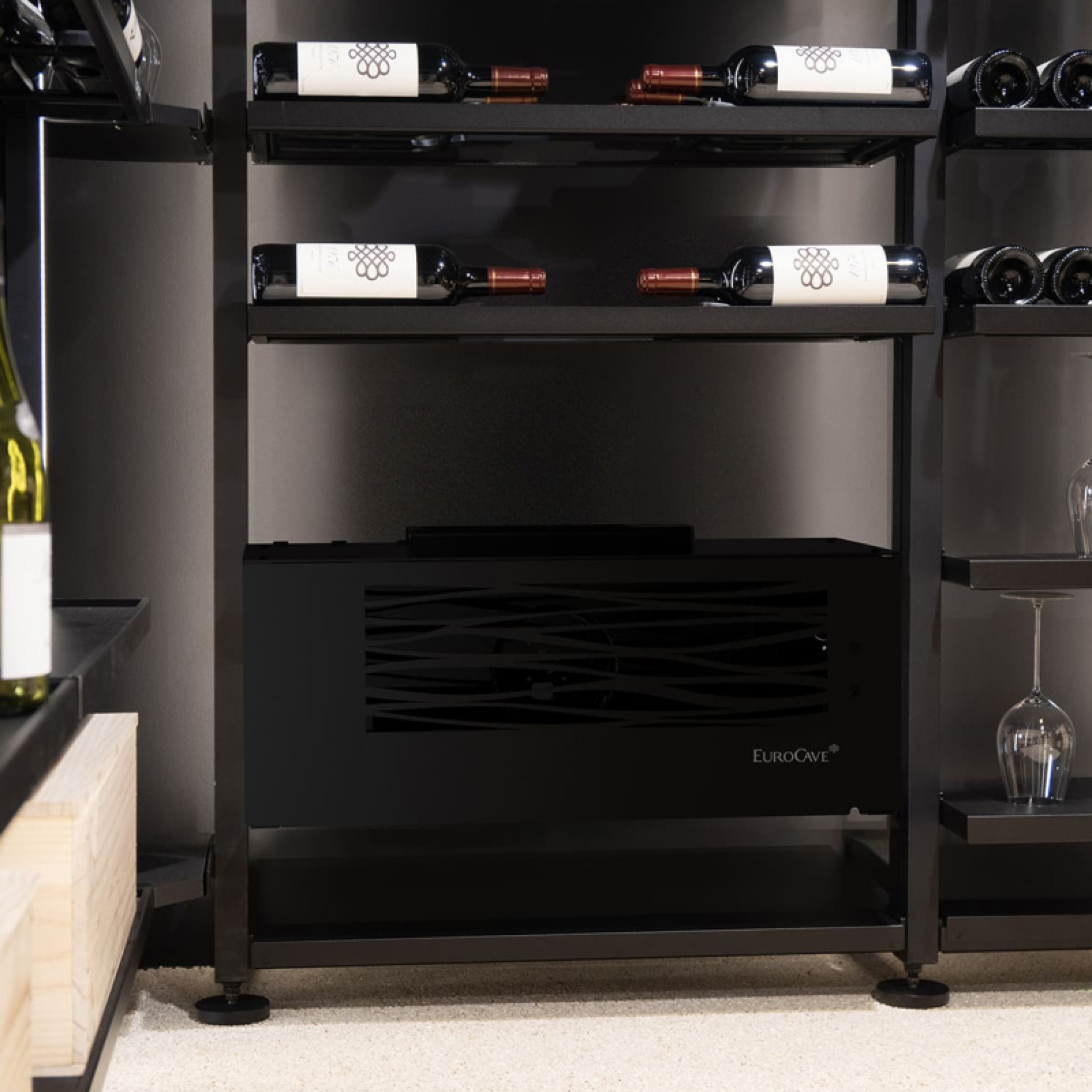 Small wine cellar air conditioner in glossy black design, water split system. Compact for easy installation attached to the wall or placed on the floor. Small wine cellar air conditioner in glossy black design, water split system. Compact for easy installation attached to the wall or placed on the floor.