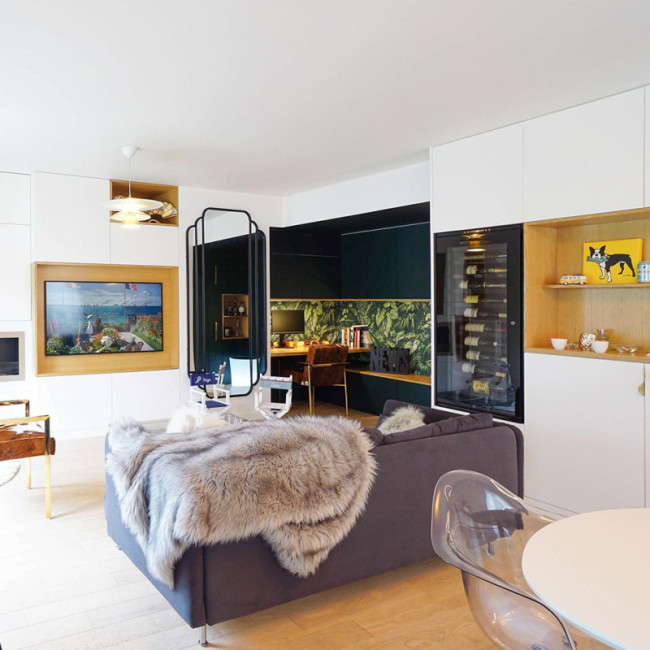 EuroCave wine fridge integrated into custom furniture in the context of a Paris apartment renovation by Bardin Architecte EuroCave wine fridge integrated into custom furniture in the context of a Paris apartment renovation by Bardin Architecte