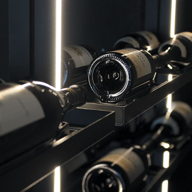 Wine cellar storage shelves with integrated lighting and multiple bottle display options. Wine cellar storage shelves with integrated lighting and multiple bottle display options.