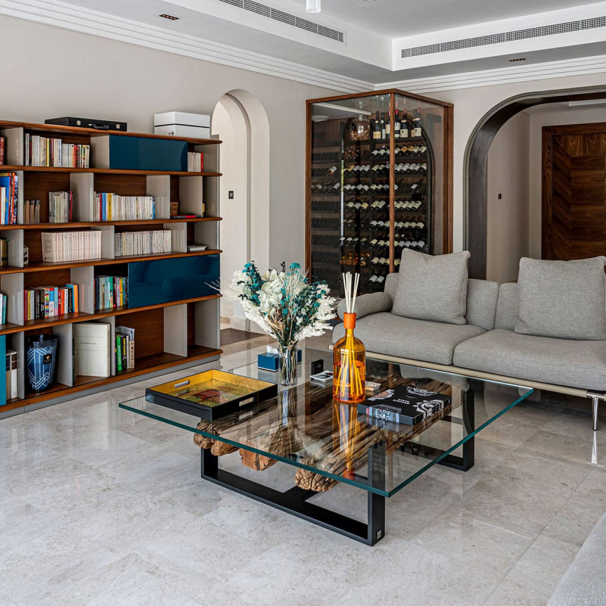 Climate-controlled wine display integrated into the living room of a modern home. Climate-controlled wine display integrated into the living room of a modern home.