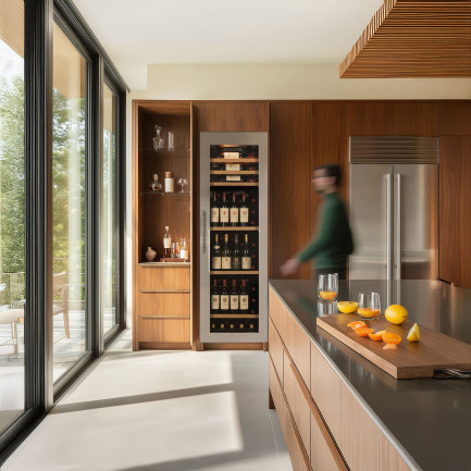 Ageing wine fridge with a stainless steel technical glass door, built into a kitchen cabinet - Inspiration EuroCave