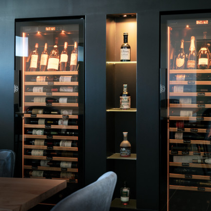 Designer wine ageing cabinet built into a custom fridge in a living room - EuroCave Revelation