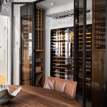 Contemporary wine architecture featuring twin EuroCave Compact units for optimized cooling.