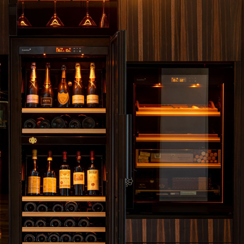 Luxury home bar featuring a EuroCave wine fridge and matching humidors.