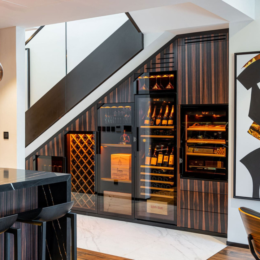 Dual-zone climate control installation for premium wine and cigar storage.